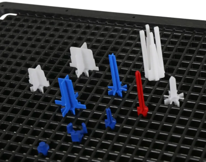 Rotatable pins for Techray and Variogrid trays